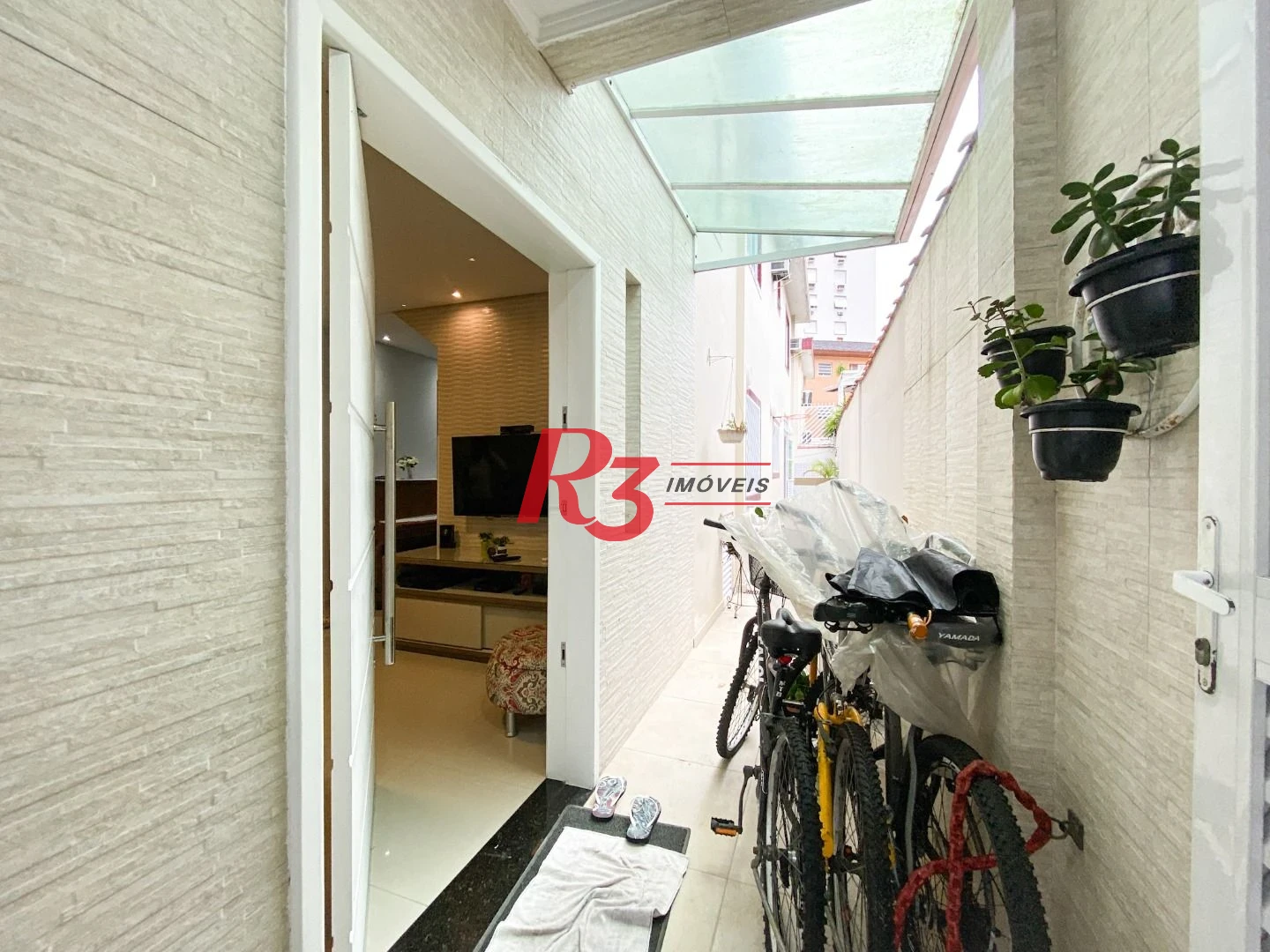 Sobrado com 3 dormitórios à venda, 130 m² por R$ 1.180.000,00 - José Menino - Santos/SP