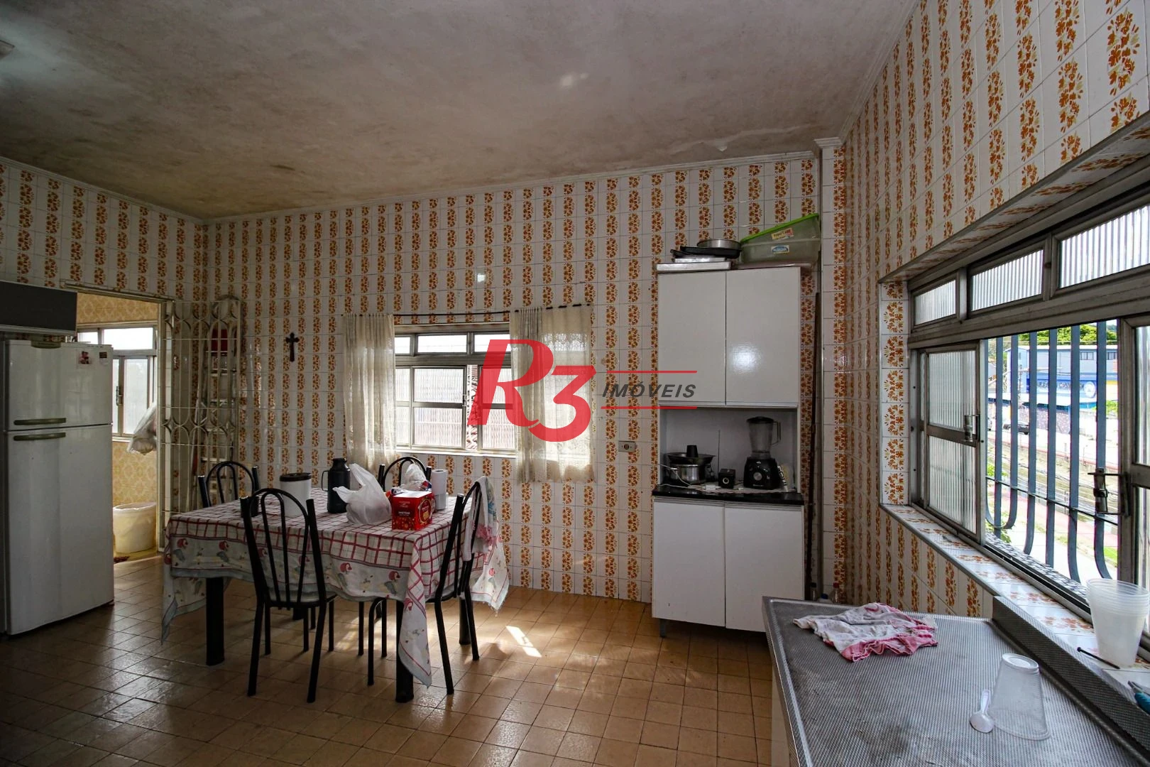 Prédio à venda, 400 m² por R$ 1.350.000,00 - Areia Branca - Santos/SP