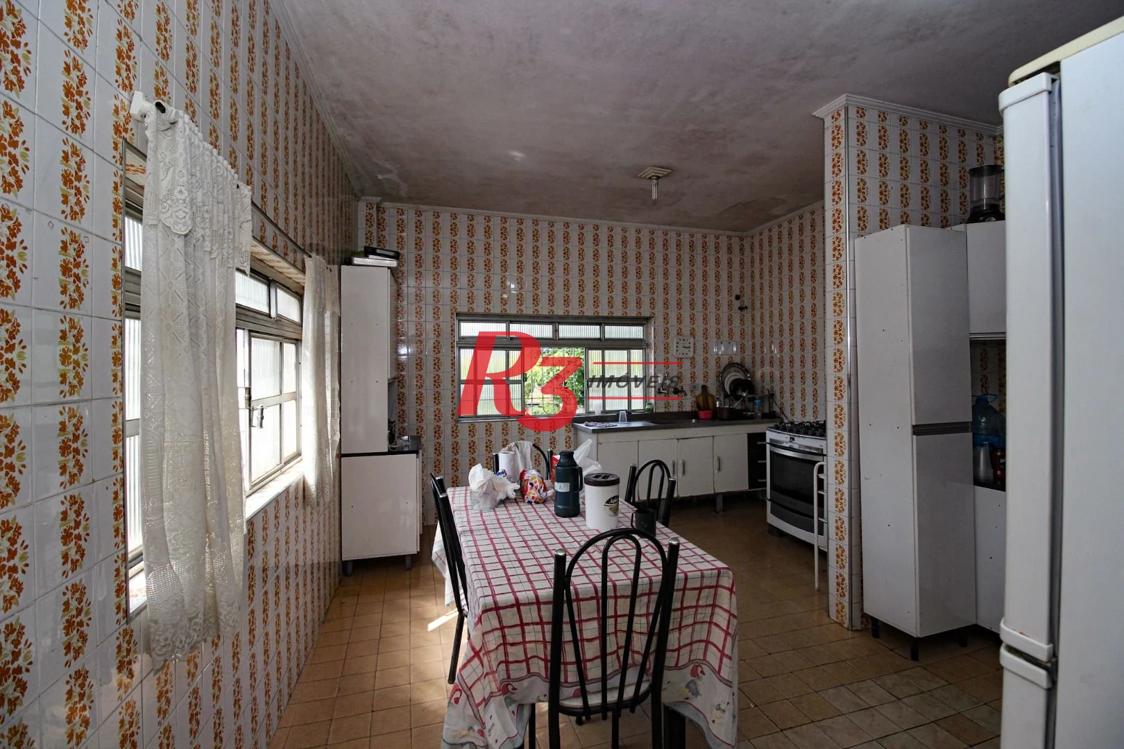 Prédio à venda, 400 m² por R$ 1.350.000,00 - Areia Branca - Santos/SP