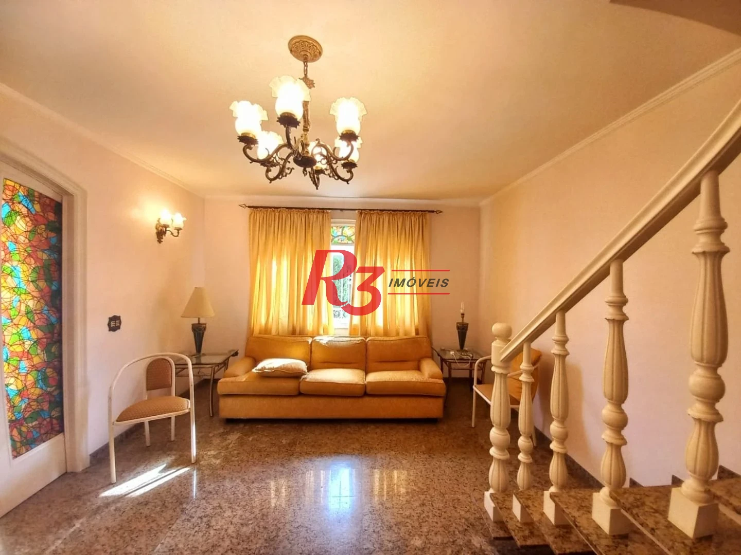 Sobrado com 3 dormitórios à venda, 131 m² por R$ 980.000,00 - Boqueirão - Santos/SP