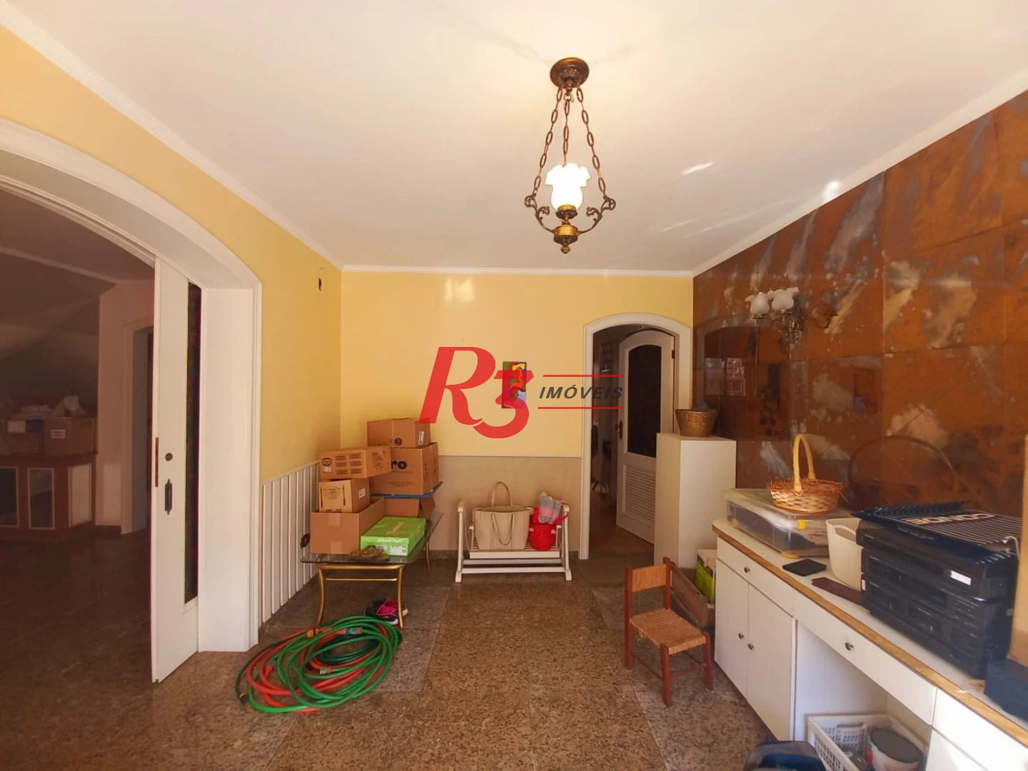 Sobrado com 3 dormitórios à venda, 131 m² por R$ 980.000,00 - Boqueirão - Santos/SP