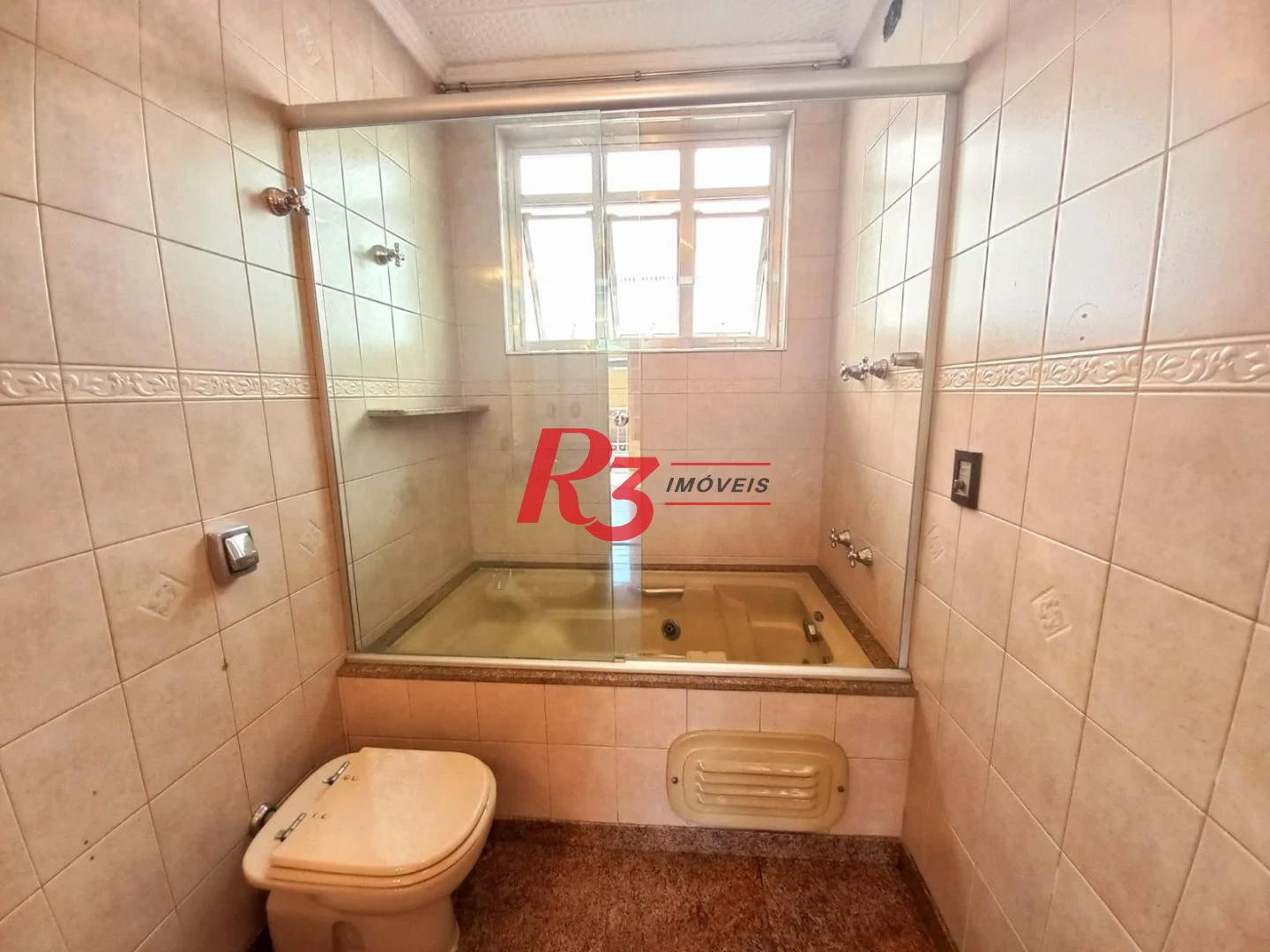 Sobrado com 3 dormitórios à venda, 131 m² por R$ 980.000,00 - Boqueirão - Santos/SP