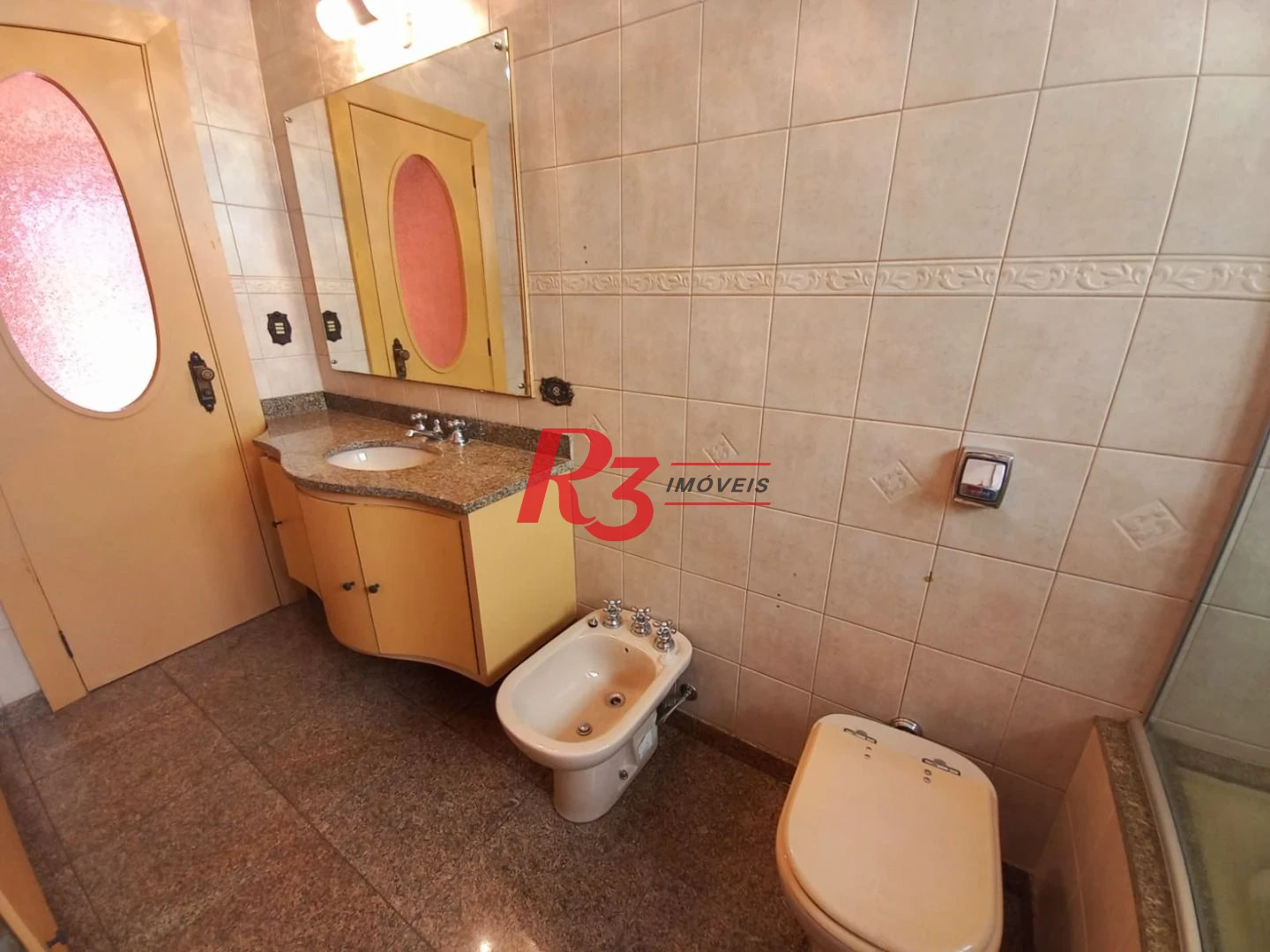 Sobrado com 3 dormitórios à venda, 131 m² por R$ 980.000,00 - Boqueirão - Santos/SP