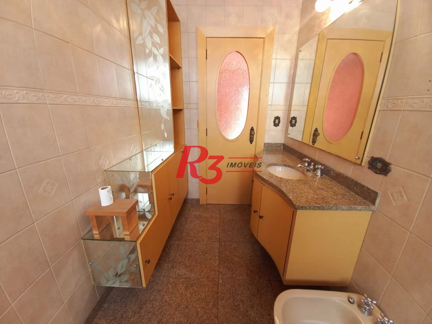 Sobrado com 3 dormitórios à venda, 131 m² por R$ 980.000,00 - Boqueirão - Santos/SP