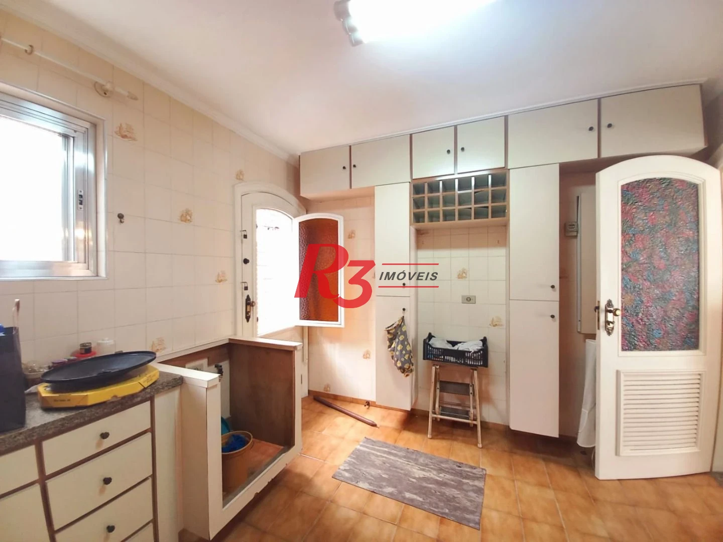 Sobrado com 3 dormitórios à venda, 131 m² por R$ 980.000,00 - Boqueirão - Santos/SP