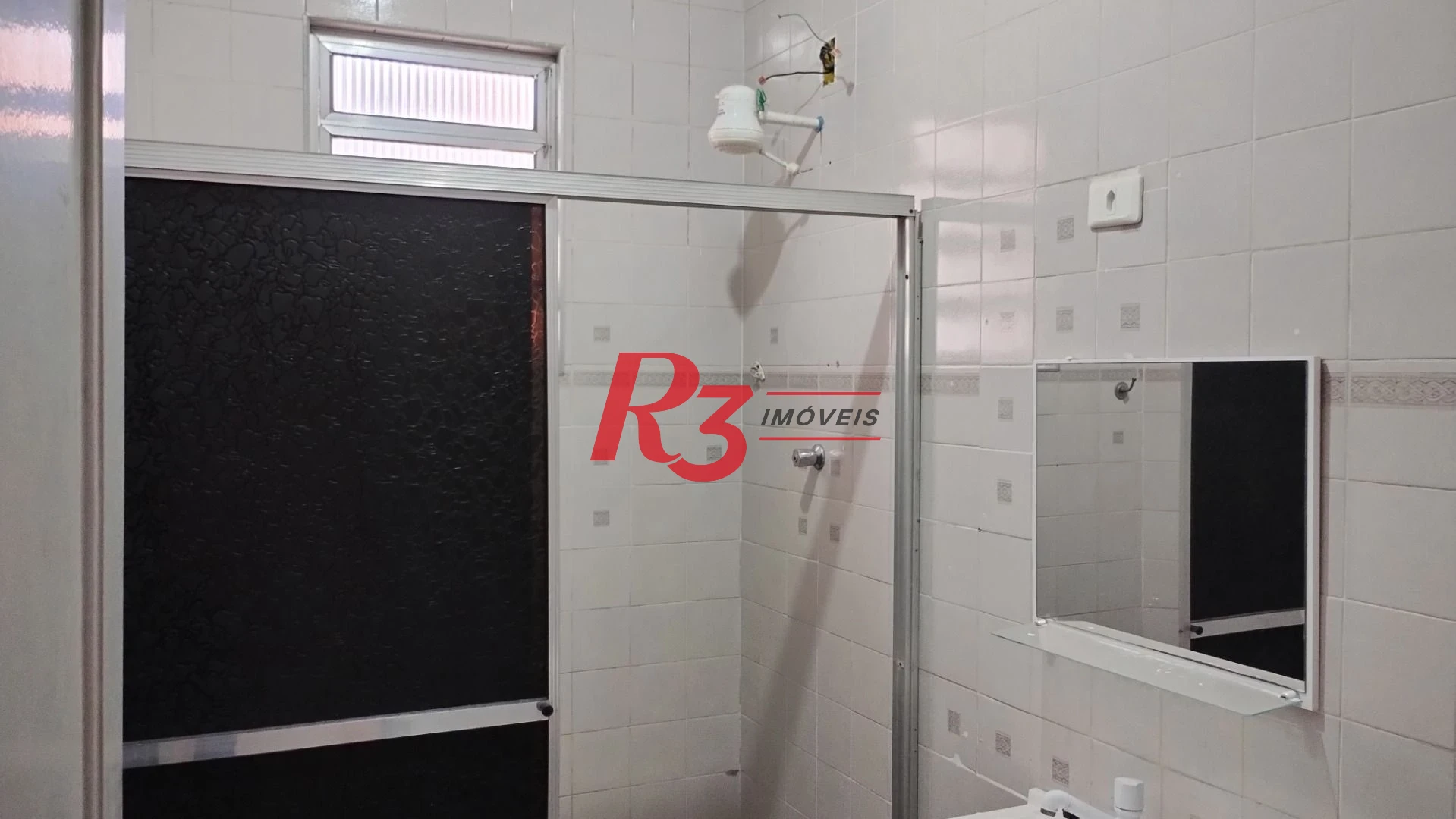 Apartamento com 2 dormitórios à venda, 76 m² por R$ 352.000,00 - Gonzaga - Santos/SP