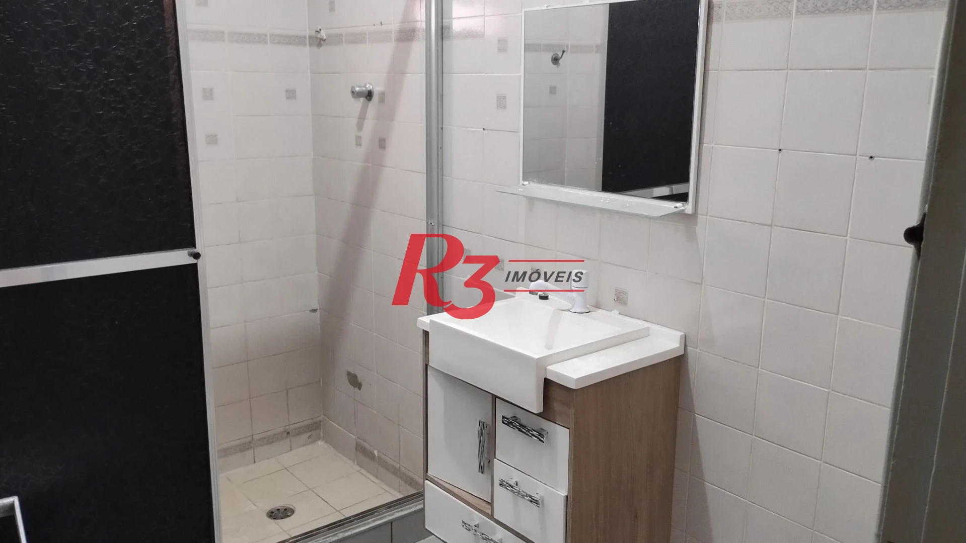 Apartamento com 2 dormitórios à venda, 76 m² por R$ 352.000,00 - Gonzaga - Santos/SP