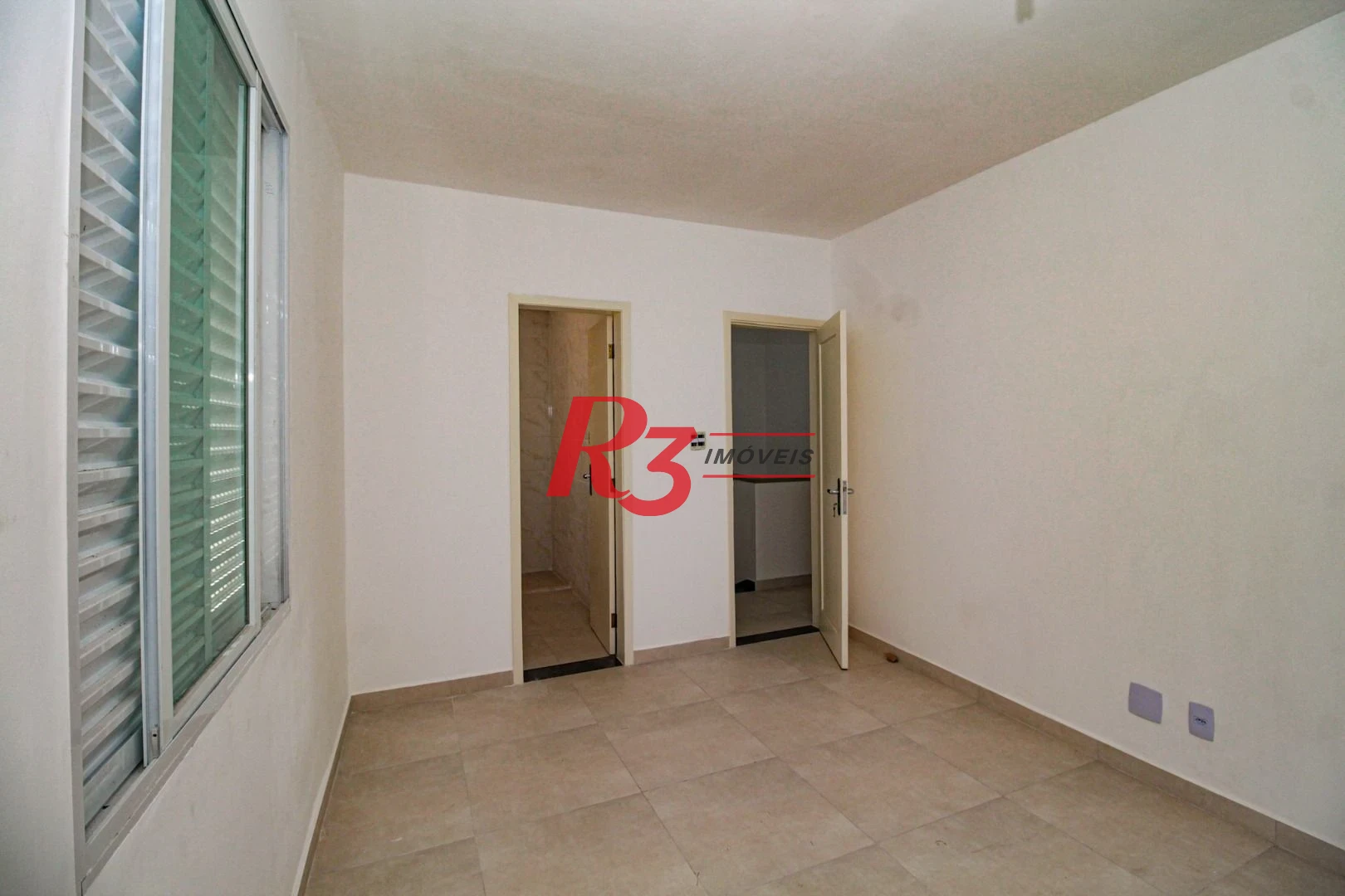 Casa à venda, 110 m² por R$ 920.000,00 - Encruzilhada - Santos/SP