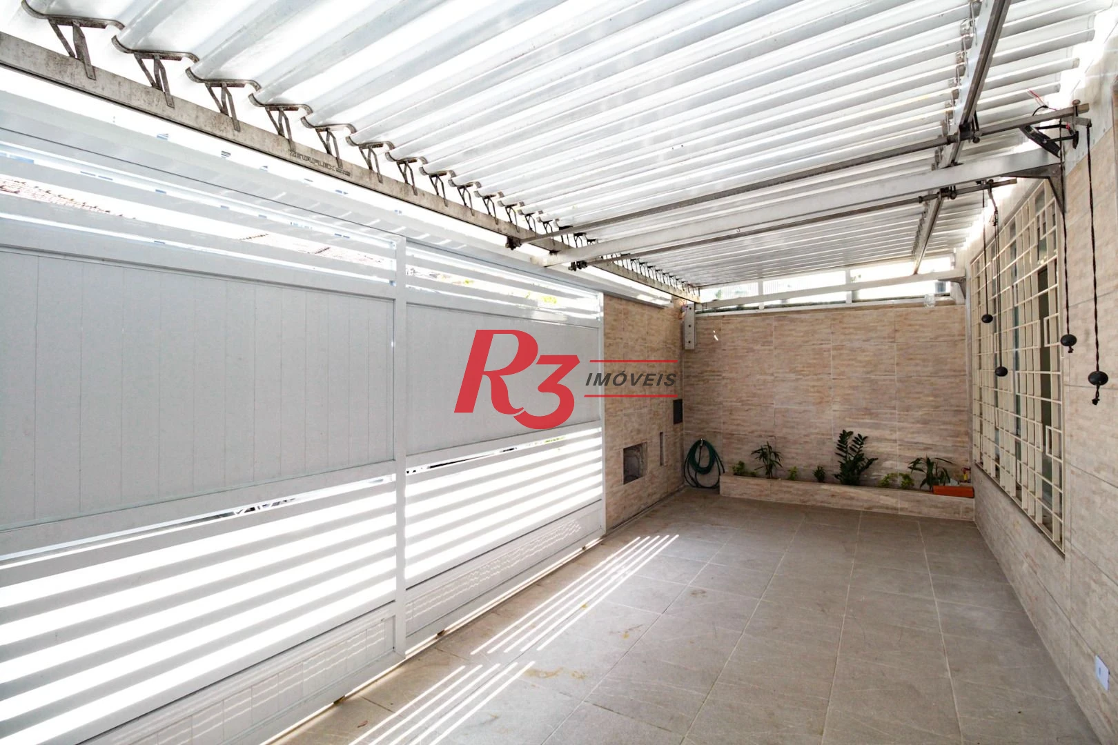 Casa à venda, 110 m² por R$ 920.000,00 - Encruzilhada - Santos/SP