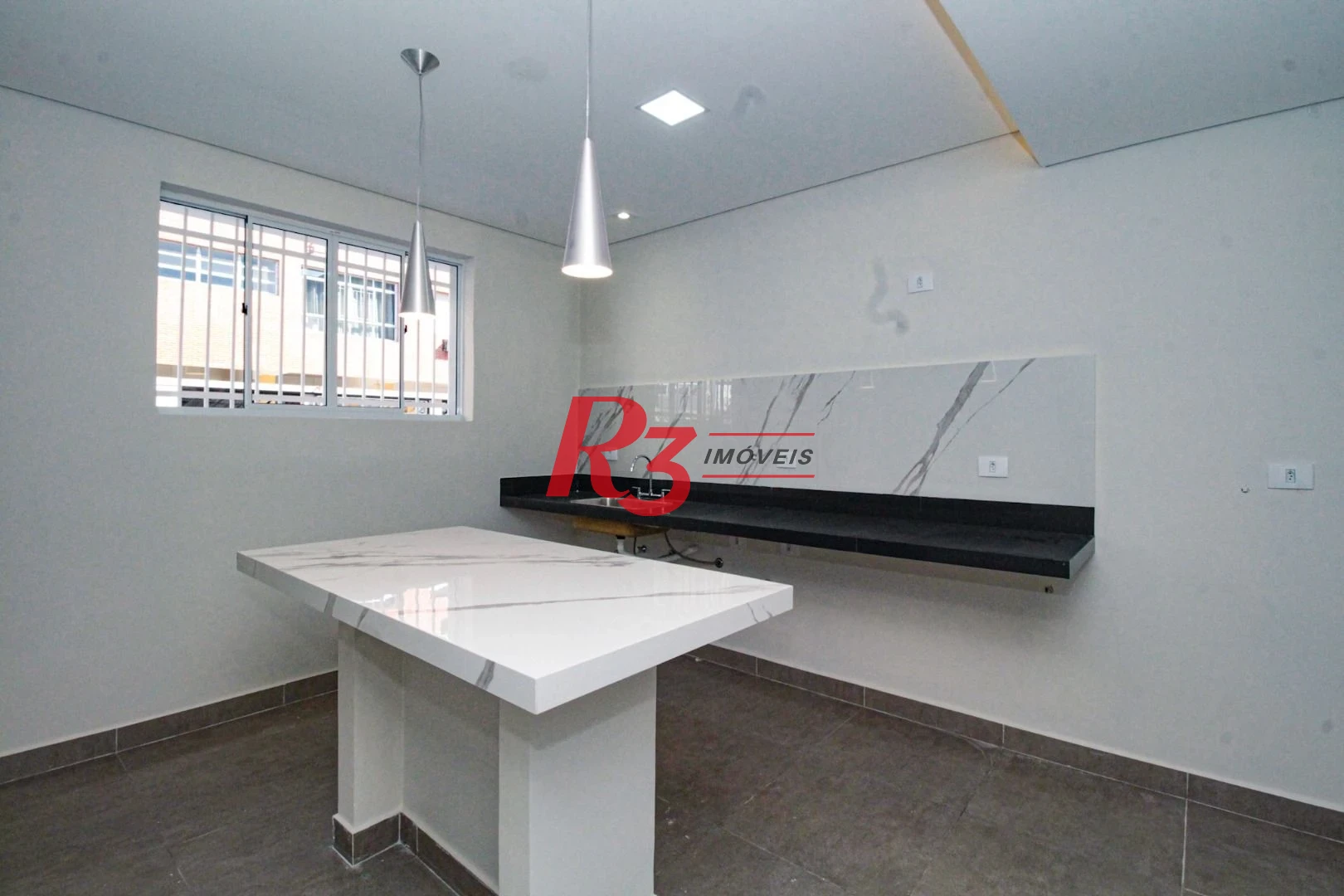 Sobrado à venda, 140 m² por R$ 648.000,00 - Marapé - Santos/SP