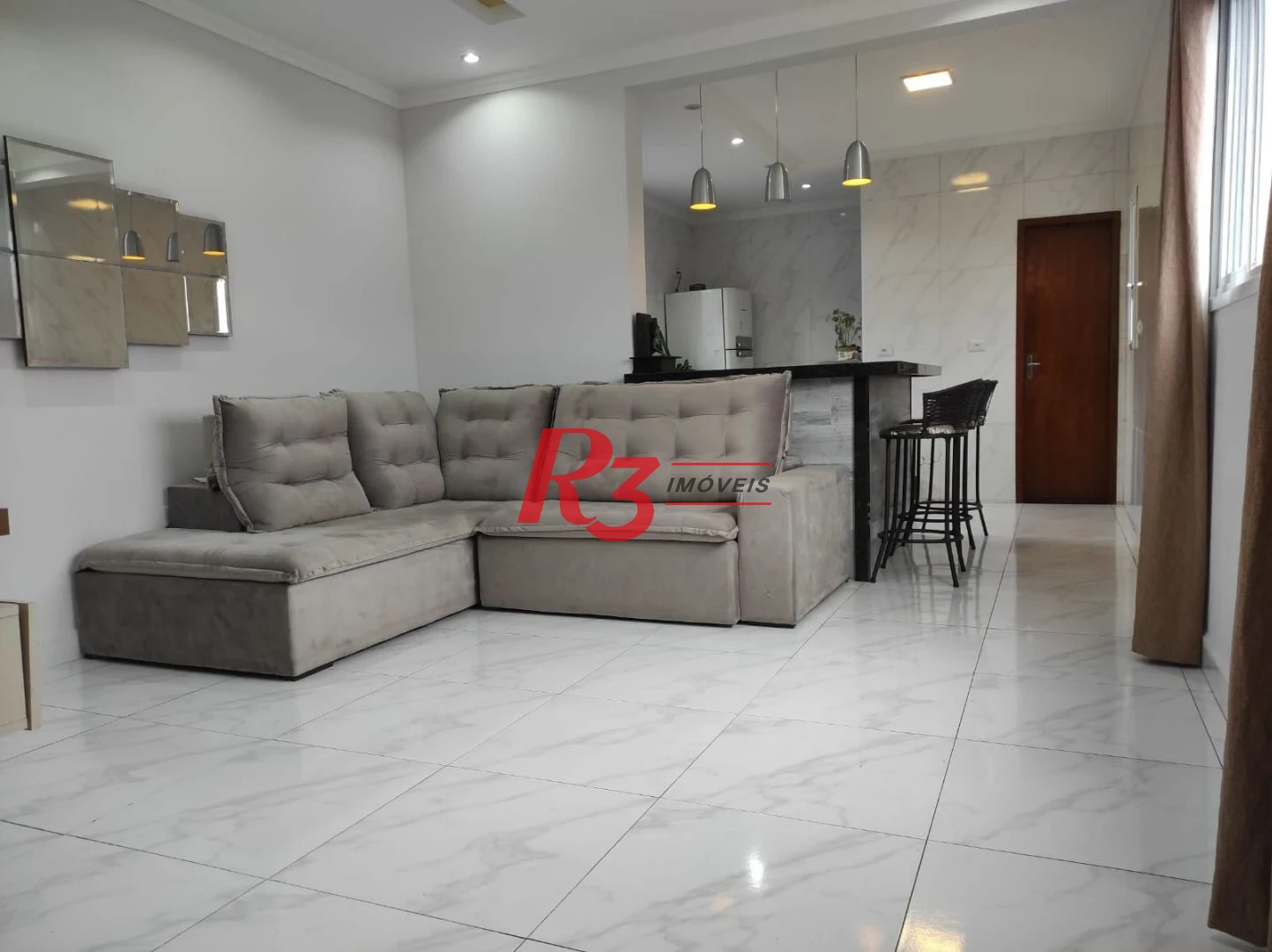 Casa à venda, 145 m² por R$ 620.000,00 - Vila Voturuá - São Vicente/SP