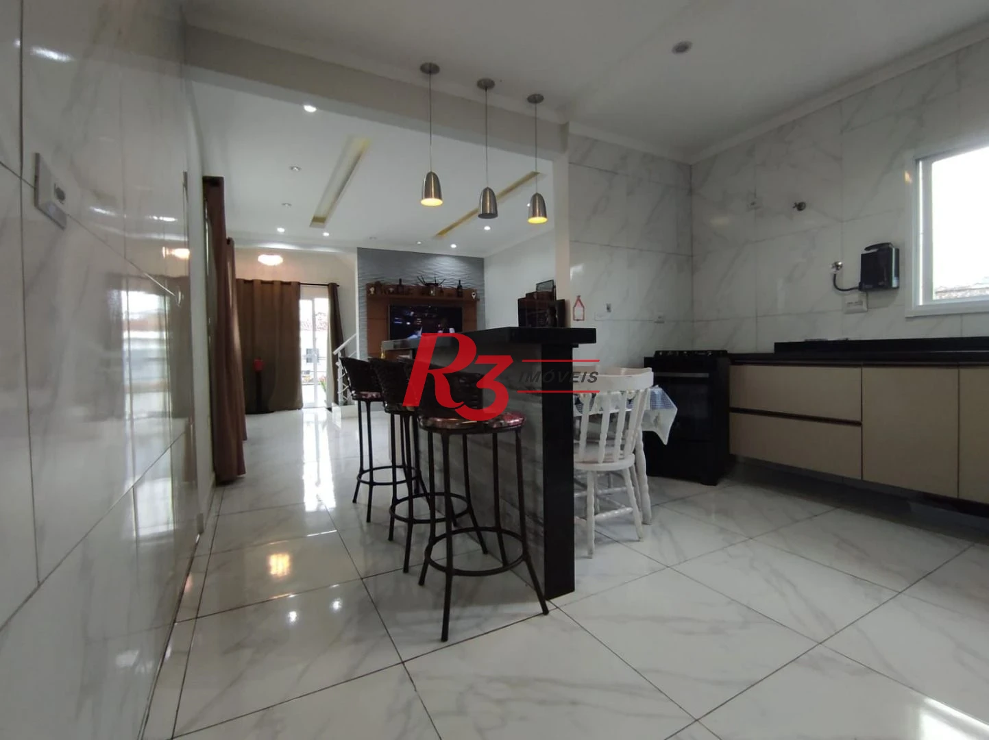 Casa à venda, 145 m² por R$ 620.000,00 - Vila Voturuá - São Vicente/SP