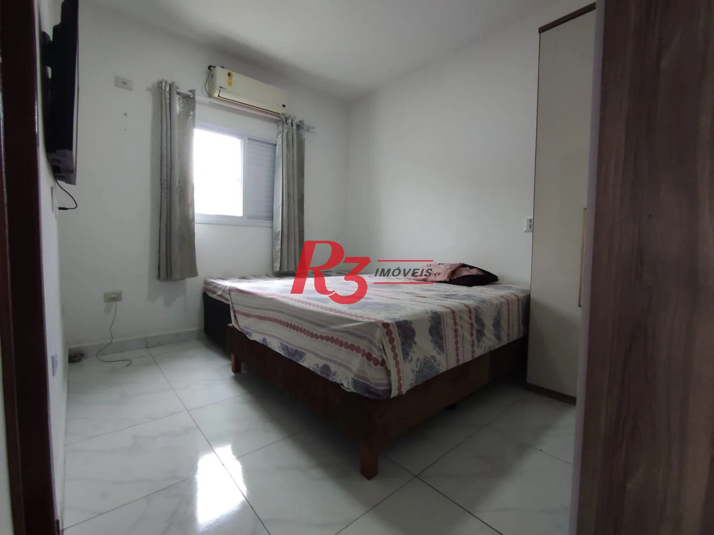 Casa à venda, 145 m² por R$ 620.000,00 - Vila Voturuá - São Vicente/SP