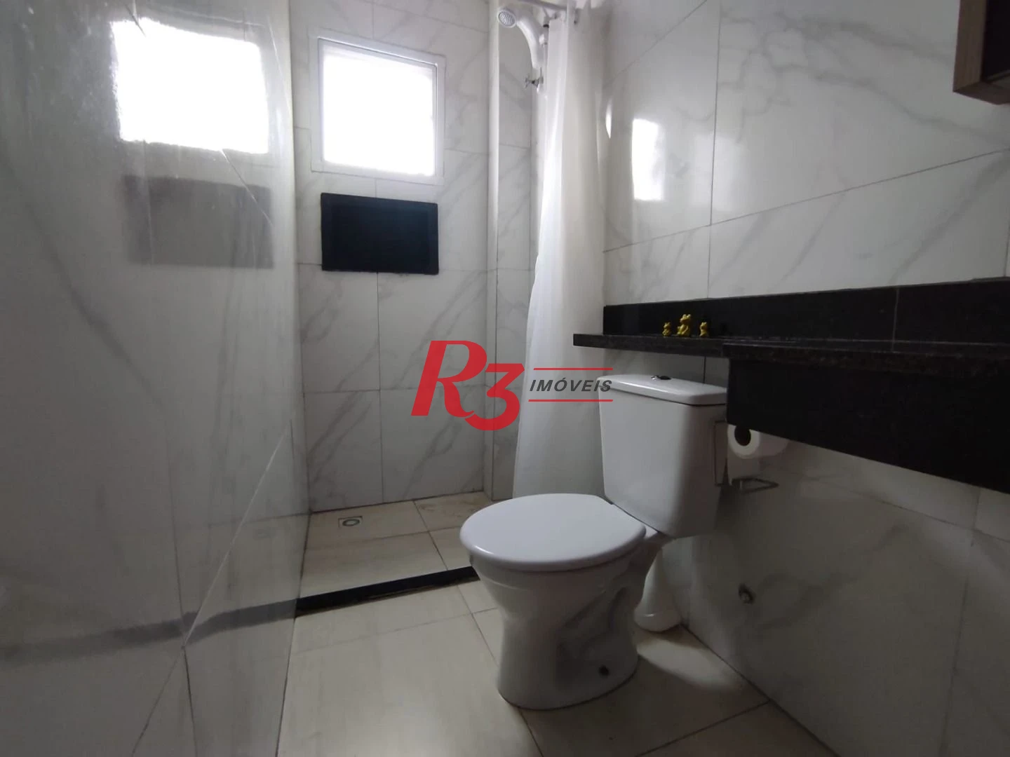 Casa à venda, 145 m² por R$ 620.000,00 - Vila Voturuá - São Vicente/SP
