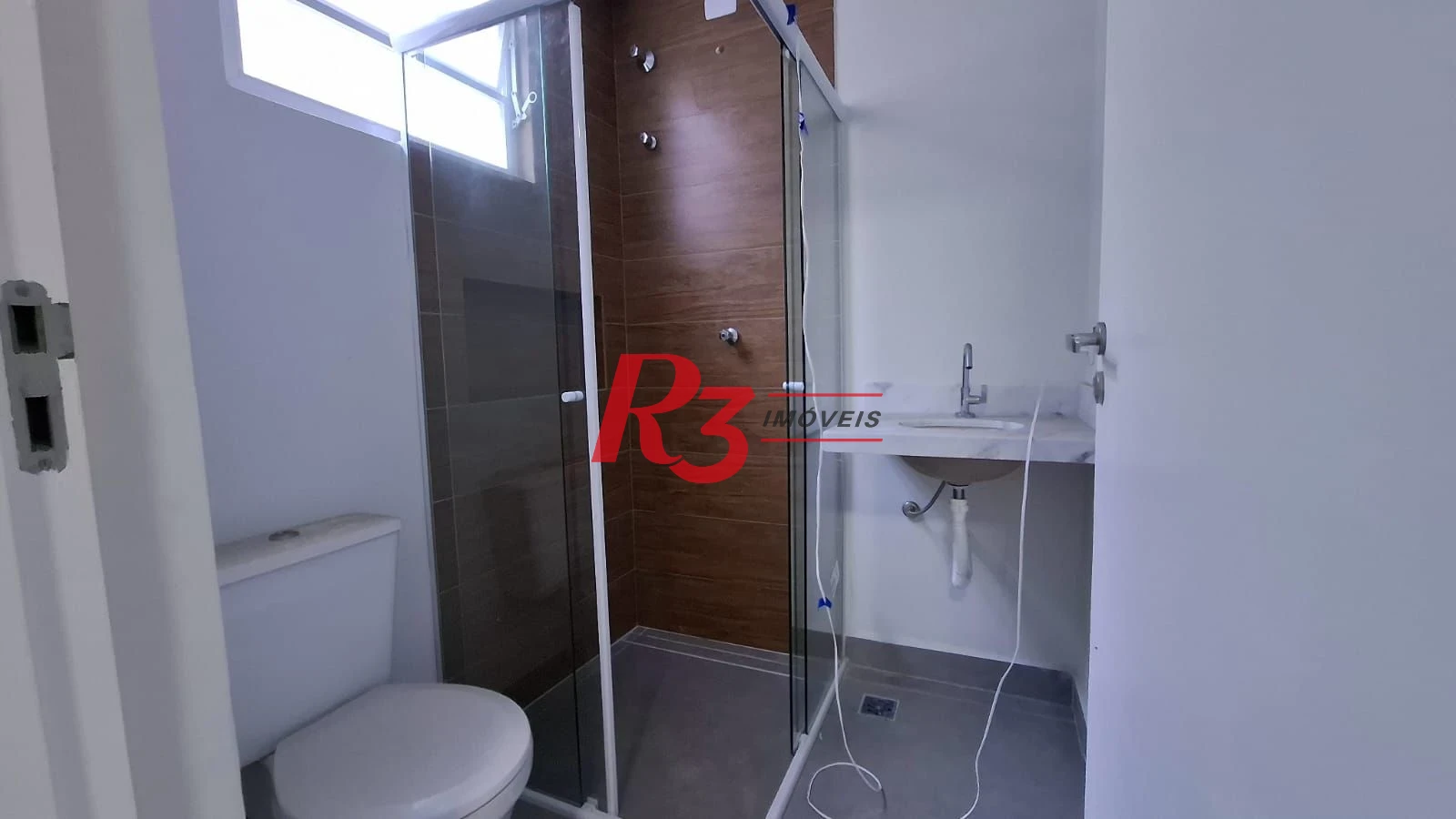 Apartamento com 2 dormitórios para alugar, 59 m² por R$ 3.800,00/mês - Boqueirão - Santos/SP