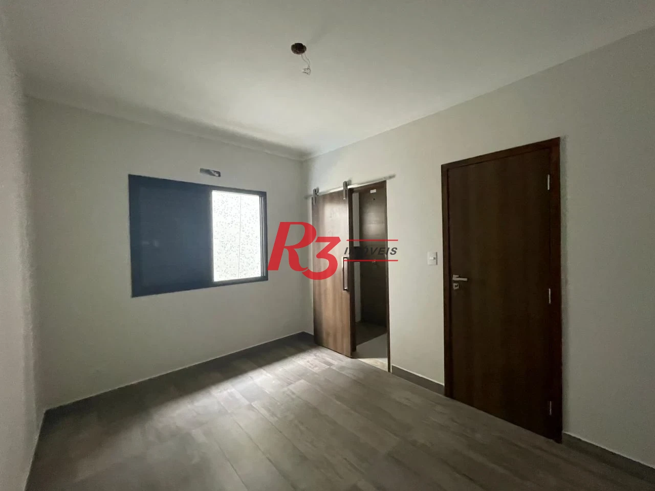 Village com 2 dormitórios à venda, 88 m² por R$ 820.000,00 - Ponta da Praia - Santos/SP