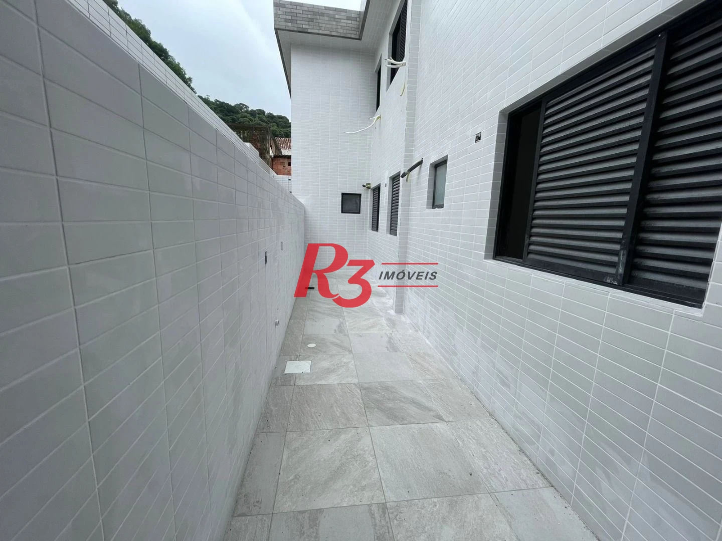 Casa à venda, 114 m² por R$ 760.000,00 - Vila Belmiro - Santos/SP