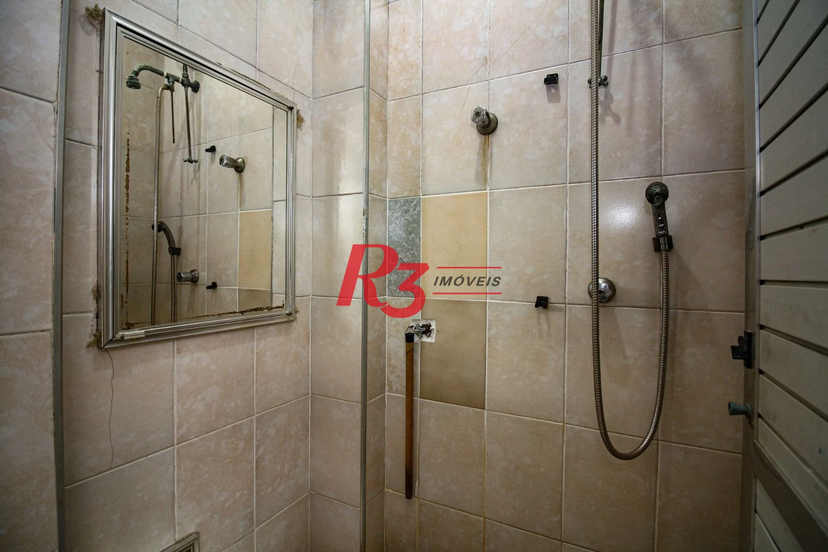 Apartamento com 3 dormitórios à venda, 146 m² por R$ 700.000,00 - Gonzaga - Santos/SP
