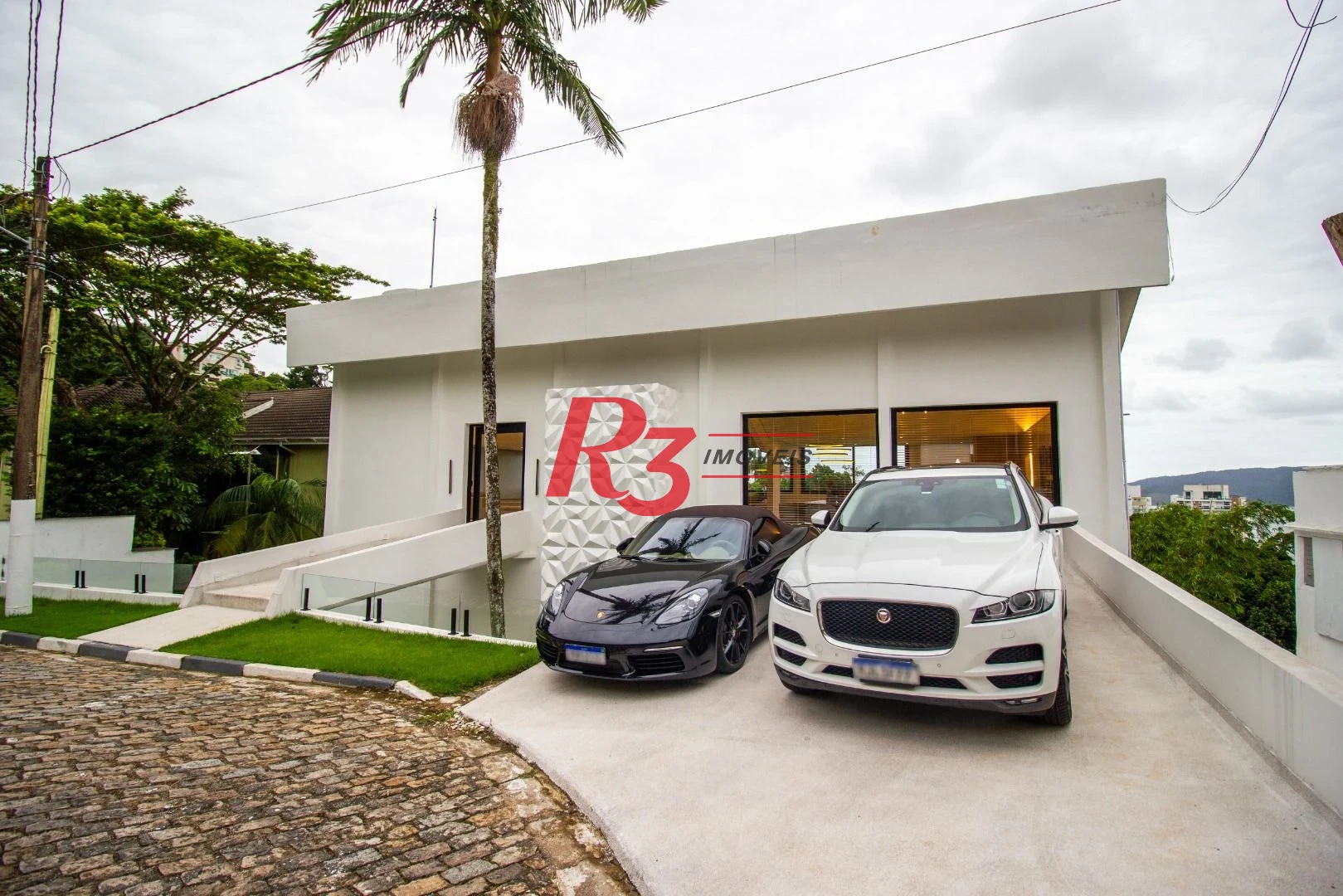 Casa com 4 dormitórios, 600 m² - venda por R$ 8.500.000,00 ou aluguel por R$ 50.000,00/mês - Marapé - Santos/SP