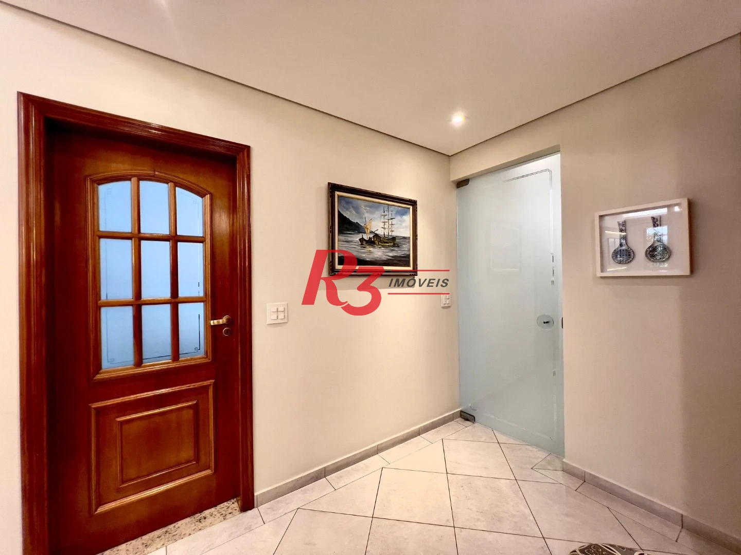 Casa com 3 dormitórios à venda, 182 m² por R$ 1.700.000,00 - Embaré - Santos/SP