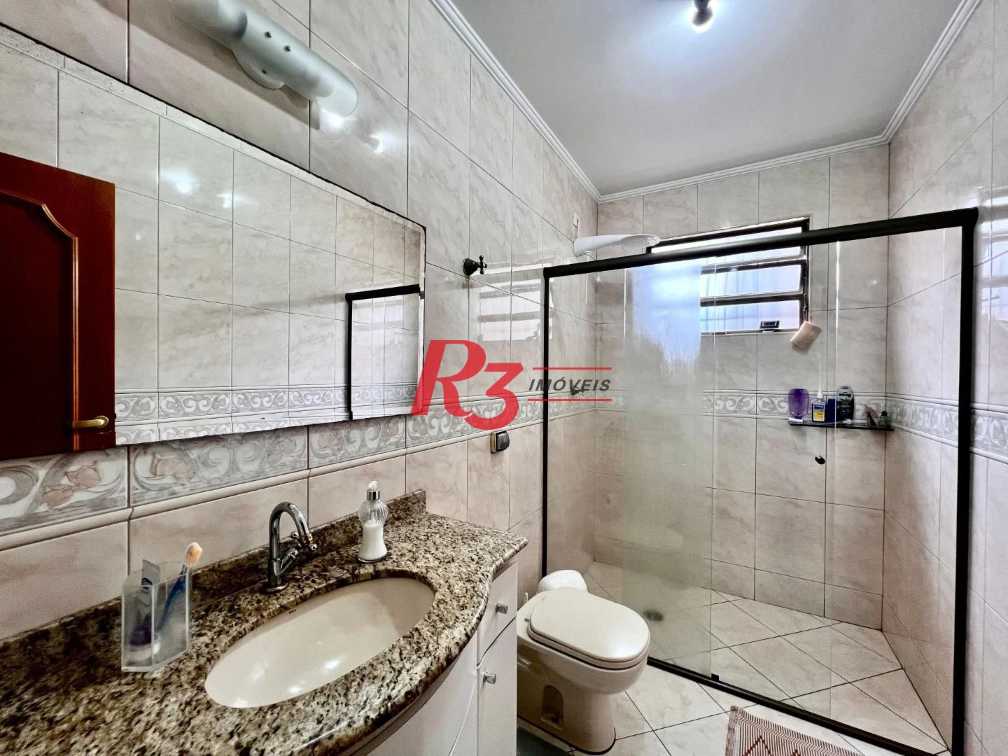 Casa com 3 dormitórios à venda, 182 m² por R$ 1.700.000,00 - Embaré - Santos/SP