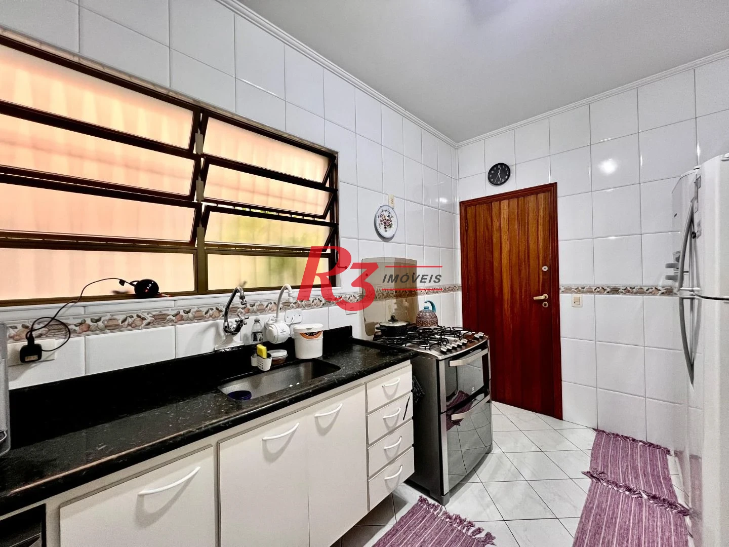 Casa com 3 dormitórios à venda, 182 m² por R$ 1.700.000,00 - Embaré - Santos/SP