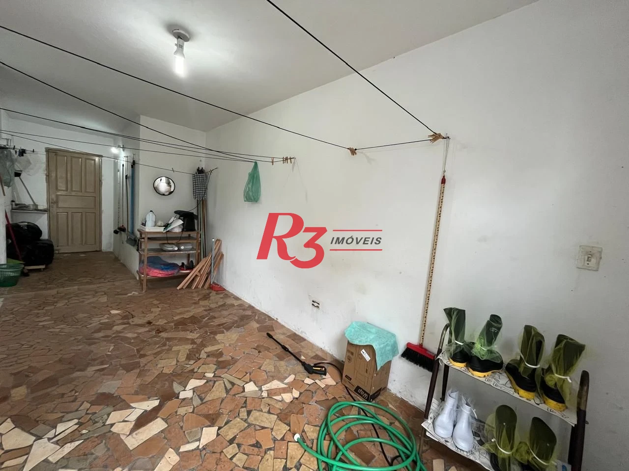 Sobrado com 3 dormitórios à venda, 115 m² por R$ 600.000,00 - Ponta da Praia - Santos/SP