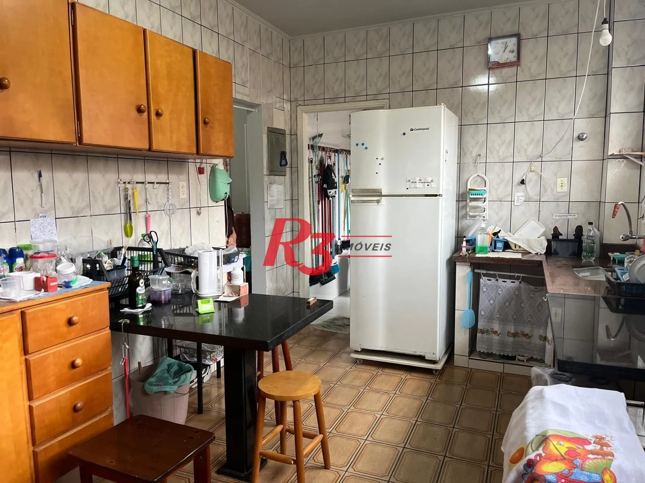 Sobrado com 3 dormitórios à venda, 115 m² por R$ 600.000,00 - Ponta da Praia - Santos/SP