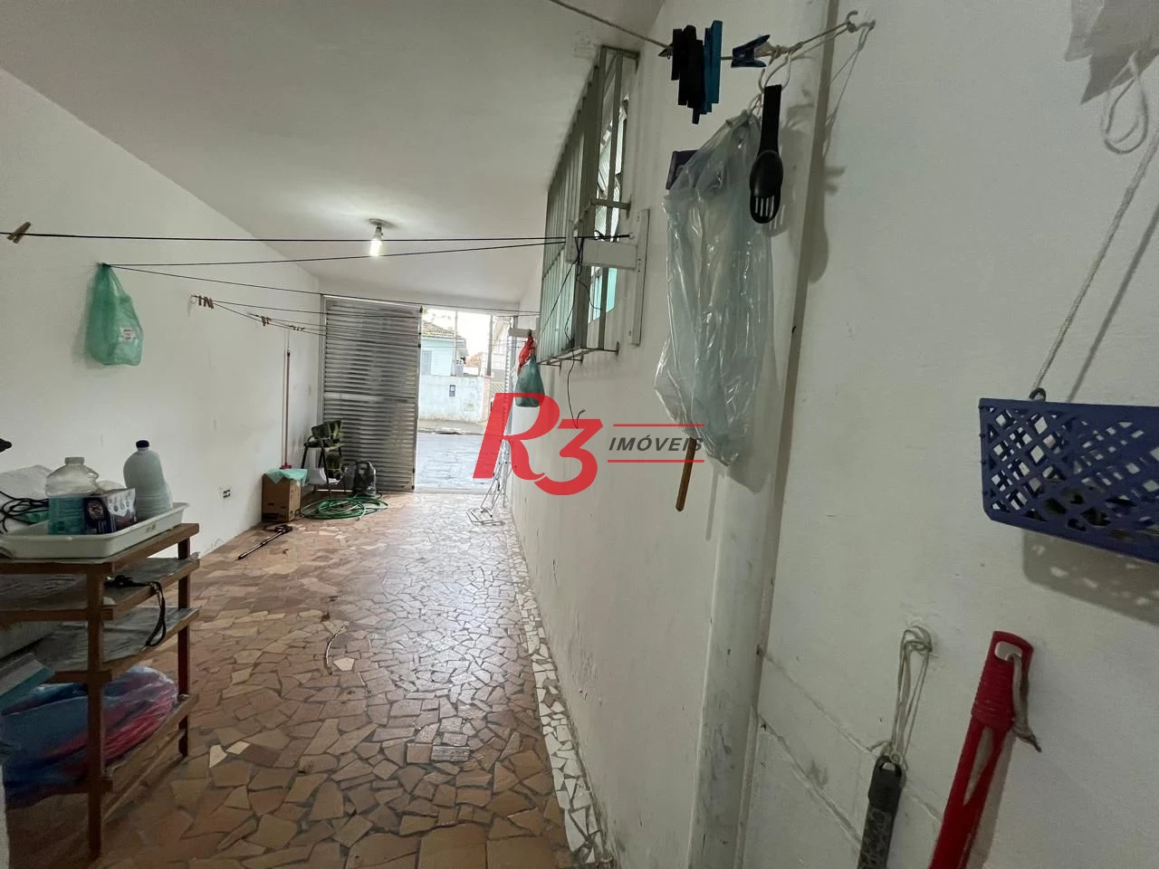 Sobrado com 3 dormitórios à venda, 115 m² por R$ 600.000,00 - Ponta da Praia - Santos/SP