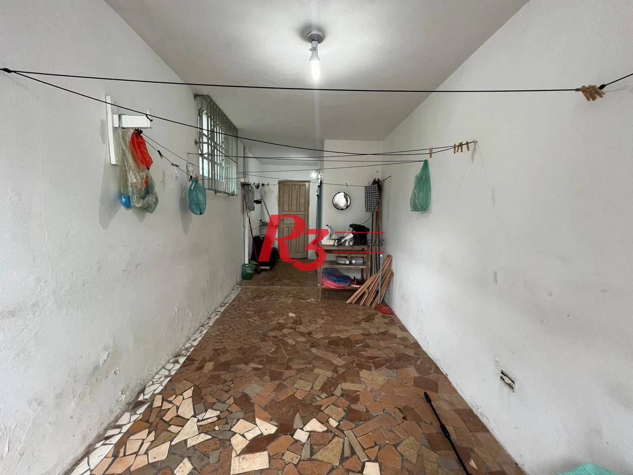 Sobrado com 3 dormitórios à venda, 115 m² por R$ 600.000,00 - Ponta da Praia - Santos/SP