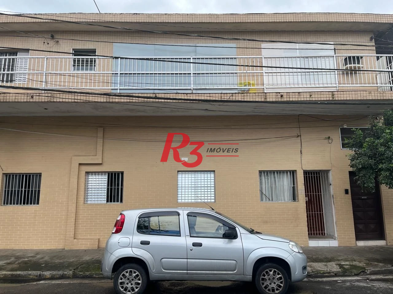 Sobrado com 3 dormitórios à venda, 115 m² por R$ 600.000,00 - Ponta da Praia - Santos/SP