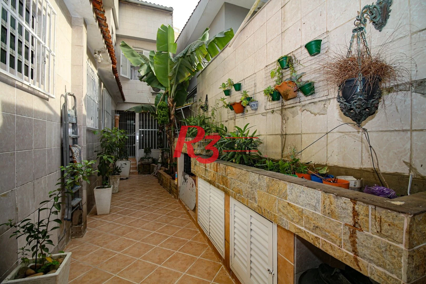 Casa com 3 dormitórios à venda, 350 m² por R$ 1.580.000,00 - Vila Belmiro - Santos/SP