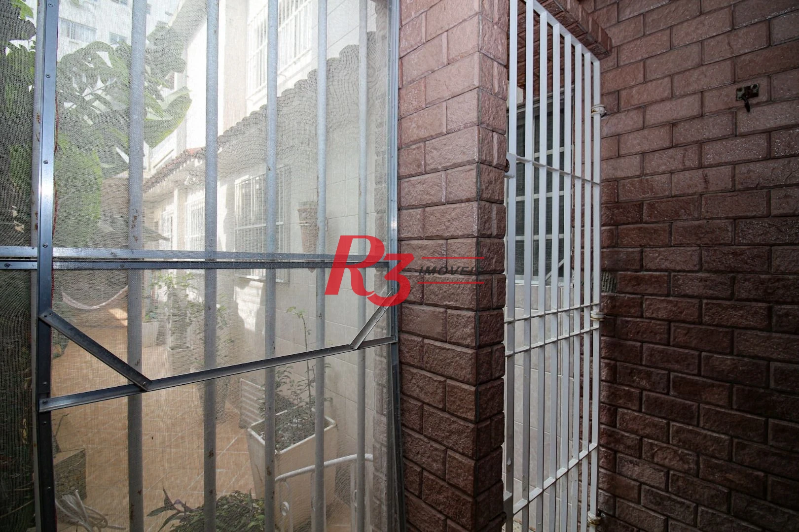 Casa com 3 dormitórios à venda, 350 m² por R$ 1.580.000,00 - Vila Belmiro - Santos/SP