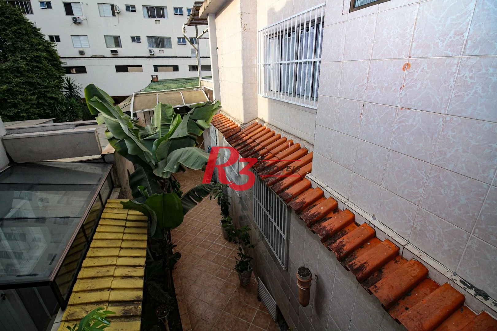 Casa com 3 dormitórios à venda, 350 m² por R$ 1.580.000,00 - Vila Belmiro - Santos/SP