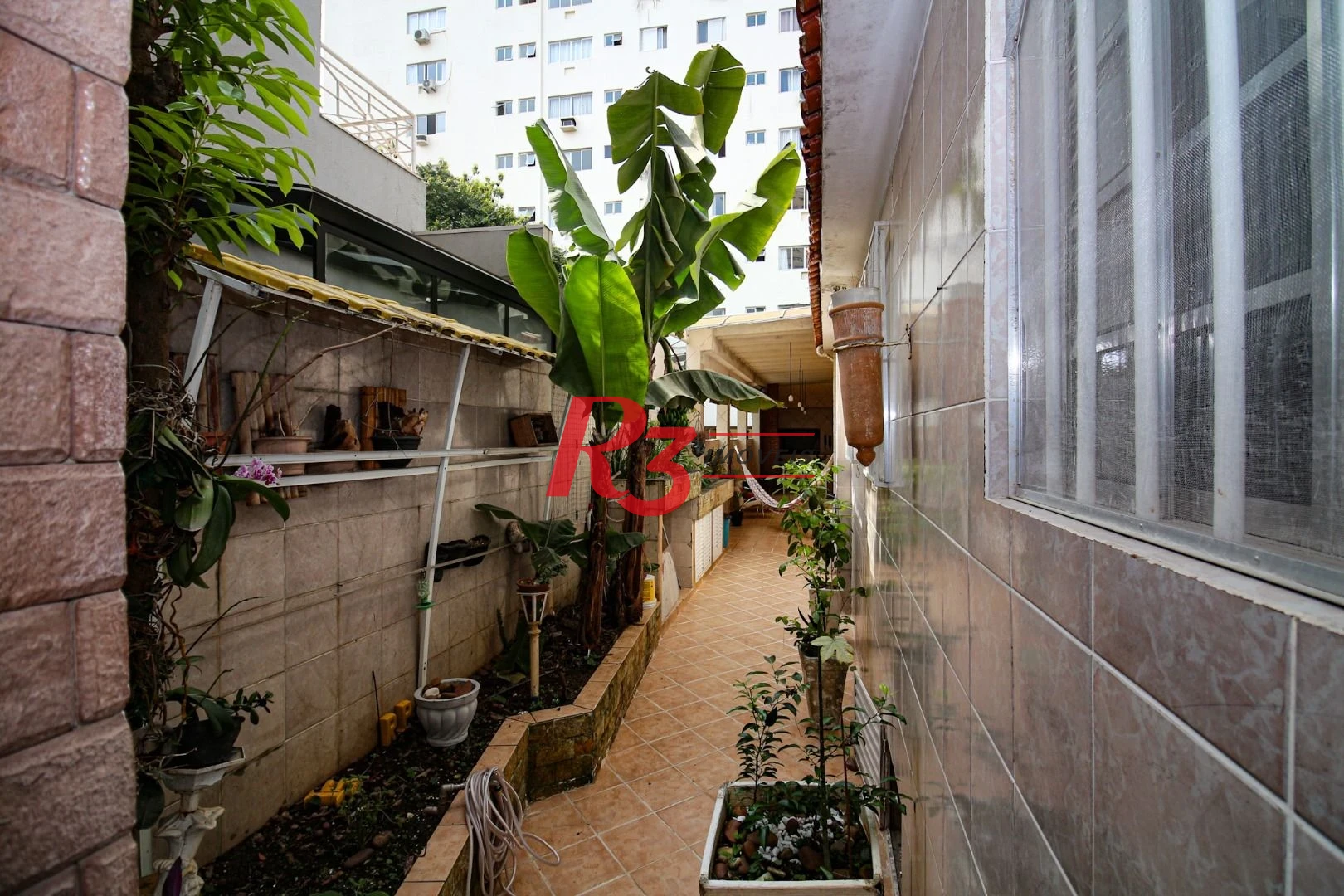 Casa com 3 dormitórios à venda, 350 m² por R$ 1.580.000,00 - Vila Belmiro - Santos/SP