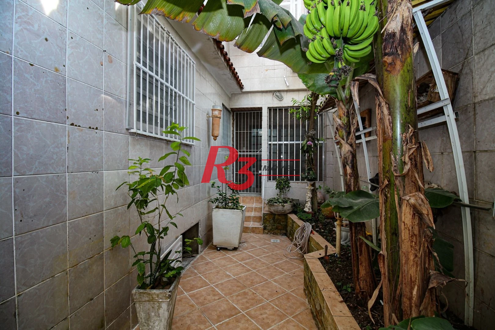Casa com 3 dormitórios à venda, 350 m² por R$ 1.580.000,00 - Vila Belmiro - Santos/SP