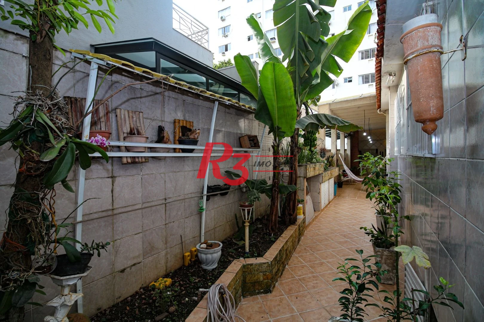 Casa com 3 dormitórios à venda, 350 m² por R$ 1.580.000,00 - Vila Belmiro - Santos/SP