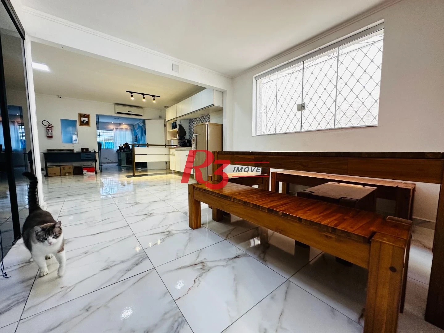 Sobrado com 4 dormitórios à venda, 245 m² por R$ 1.500.000,00 - Ponta da Praia - Santos/SP