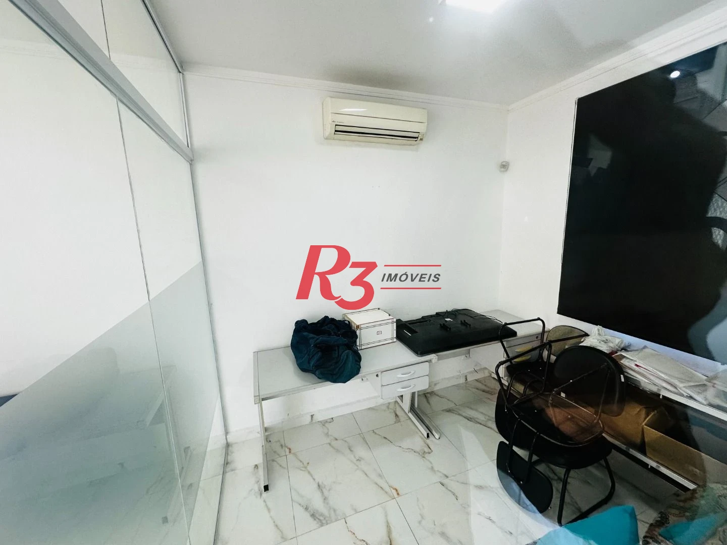 Sobrado com 4 dormitórios à venda, 245 m² por R$ 1.500.000,00 - Ponta da Praia - Santos/SP