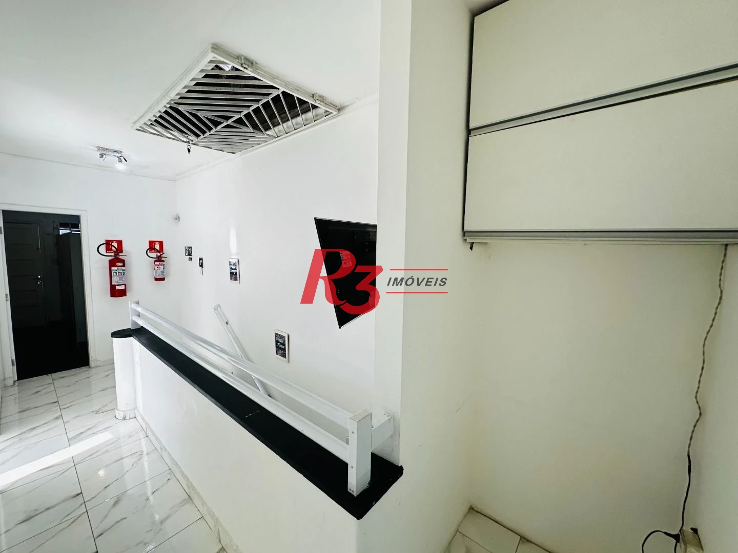 Sobrado com 4 dormitórios à venda, 245 m² por R$ 1.500.000,00 - Ponta da Praia - Santos/SP