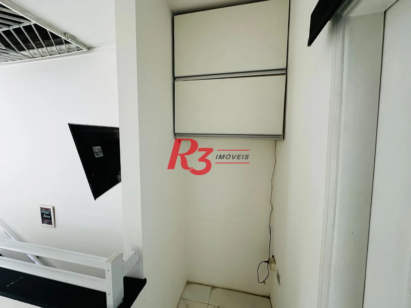 Sobrado com 4 dormitórios à venda, 245 m² por R$ 1.500.000,00 - Ponta da Praia - Santos/SP