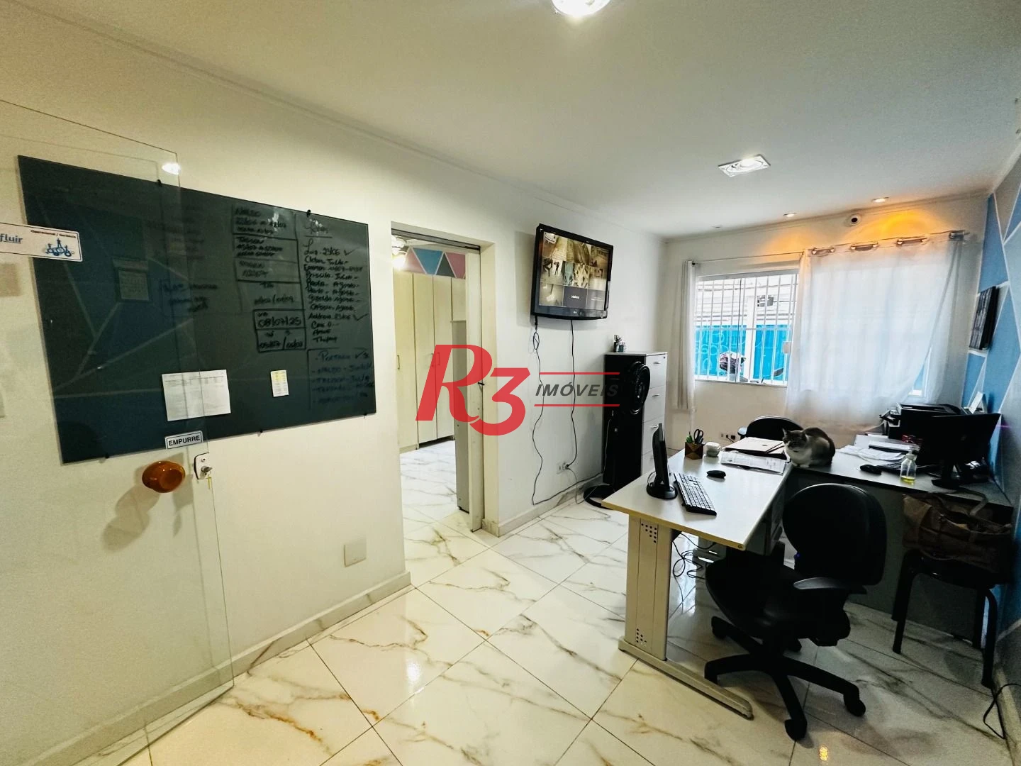 Sobrado com 4 dormitórios à venda, 245 m² por R$ 1.500.000,00 - Ponta da Praia - Santos/SP