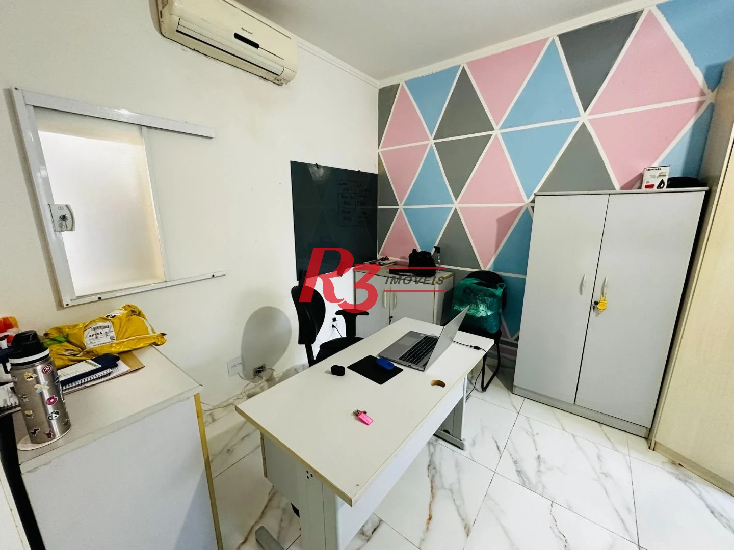 Sobrado com 4 dormitórios à venda, 245 m² por R$ 1.500.000,00 - Ponta da Praia - Santos/SP