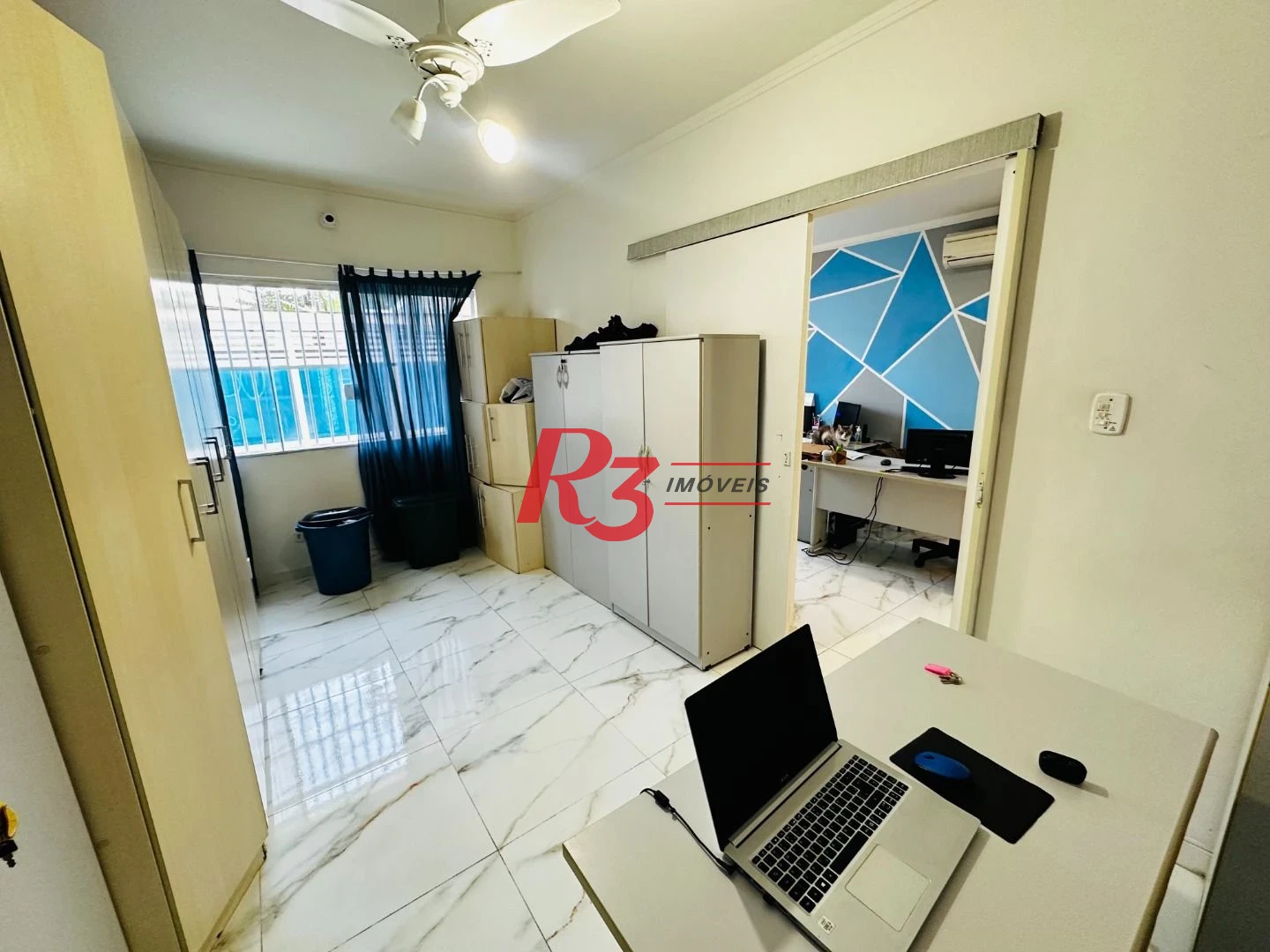 Sobrado com 4 dormitórios à venda, 245 m² por R$ 1.500.000,00 - Ponta da Praia - Santos/SP