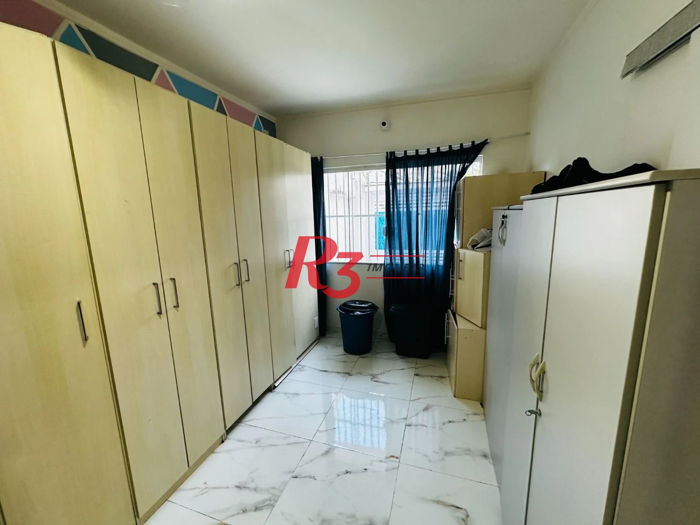 Sobrado com 4 dormitórios à venda, 245 m² por R$ 1.500.000,00 - Ponta da Praia - Santos/SP