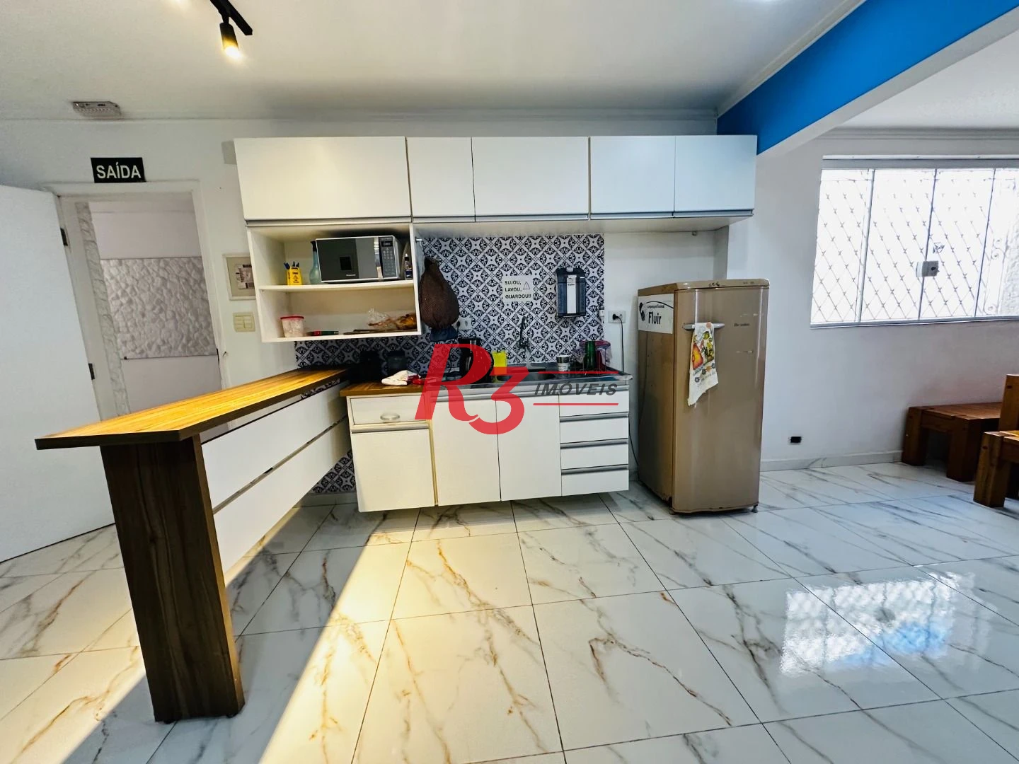 Sobrado com 4 dormitórios à venda, 245 m² por R$ 1.500.000,00 - Ponta da Praia - Santos/SP