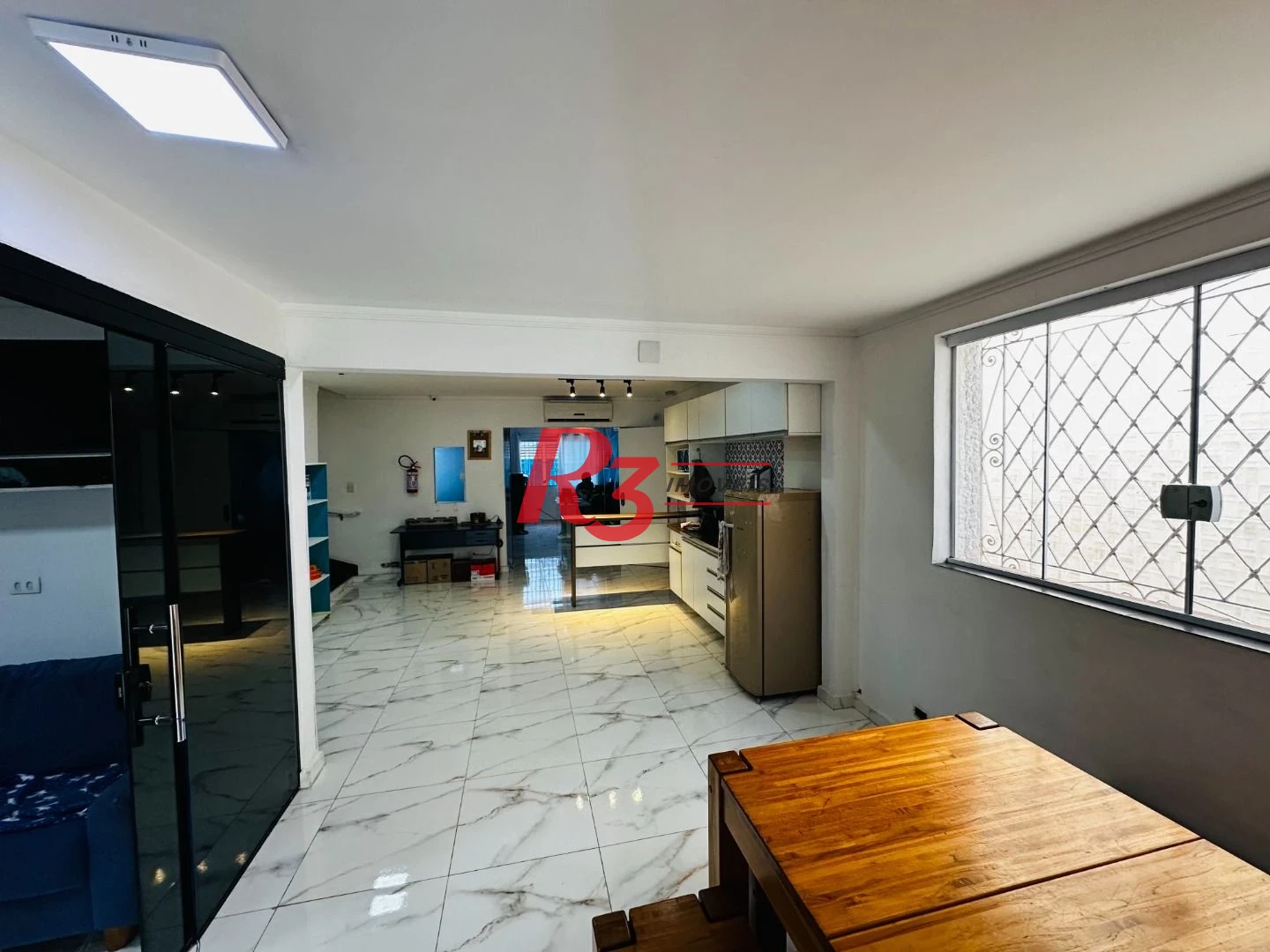 Sobrado com 4 dormitórios à venda, 245 m² por R$ 1.500.000,00 - Ponta da Praia - Santos/SP