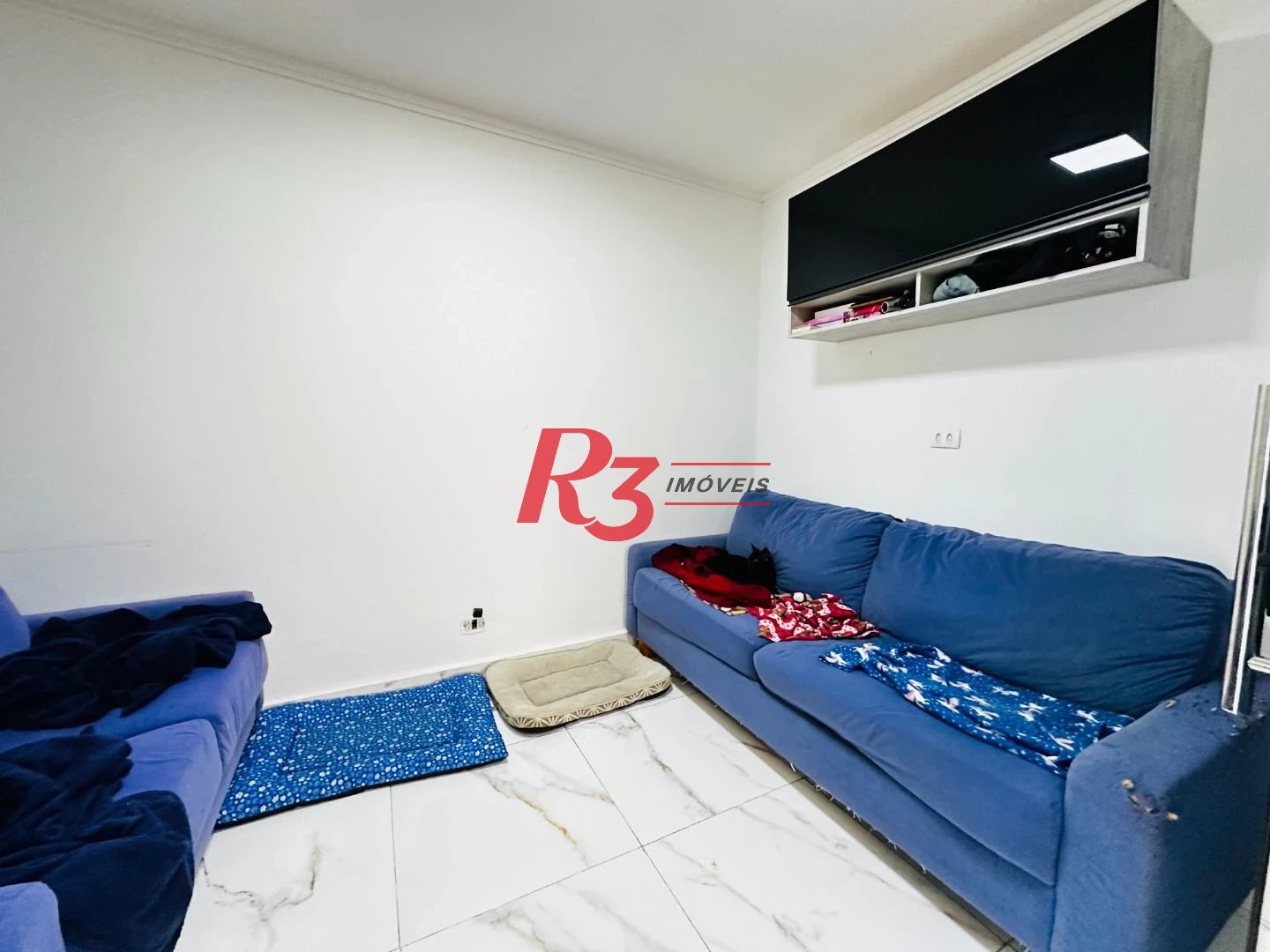 Sobrado com 4 dormitórios à venda, 245 m² por R$ 1.500.000,00 - Ponta da Praia - Santos/SP