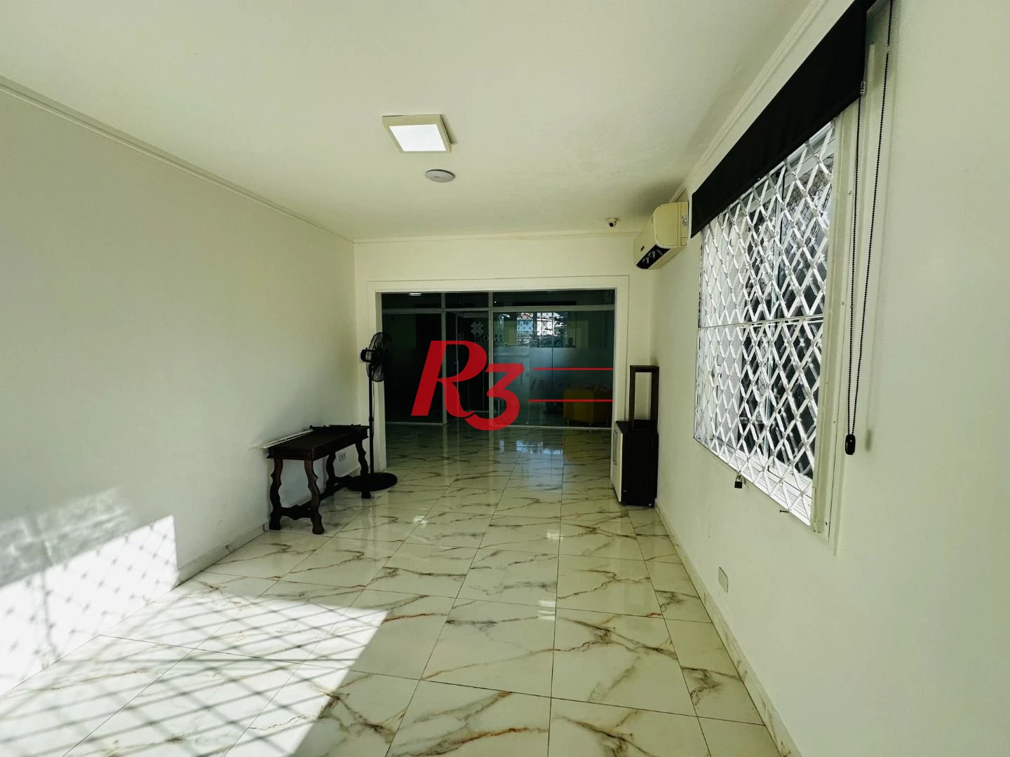 Sobrado com 4 dormitórios à venda, 245 m² por R$ 1.500.000,00 - Ponta da Praia - Santos/SP