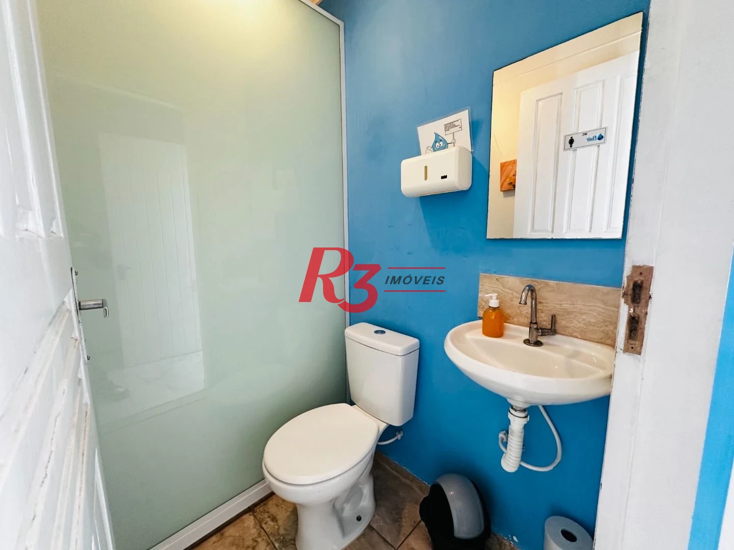 Sobrado com 4 dormitórios à venda, 245 m² por R$ 1.500.000,00 - Ponta da Praia - Santos/SP